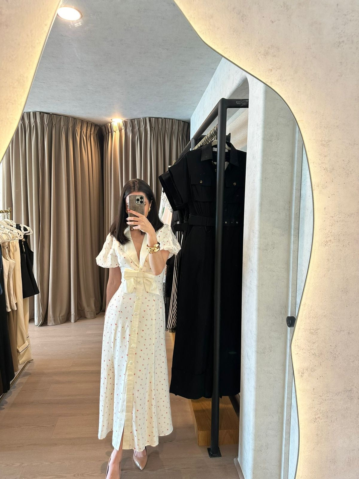 Vestido midi con detalle de moño