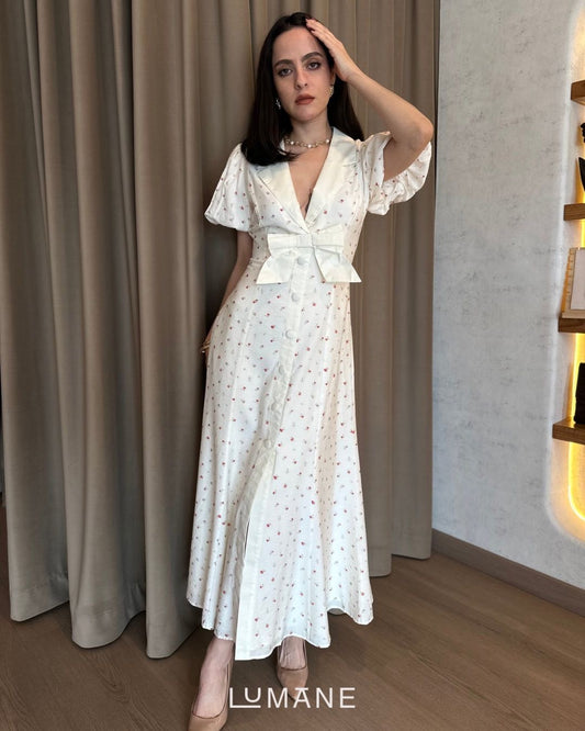 Vestido midi con detalle de moño